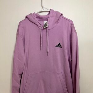 Purple Adidas hoodie with embroidered black logo, size XL
